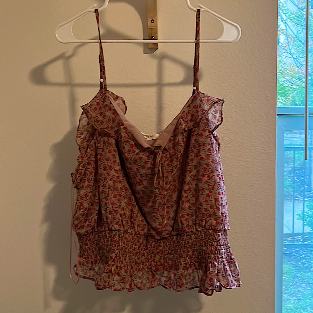 Pink blouse with adjustable straps